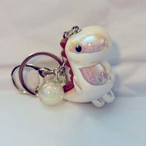 White and Brown Dinosaur Keychain